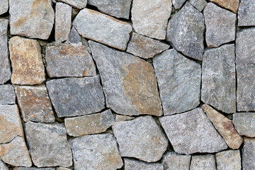 old stone wall Texture in weathered and have natural surfaces.