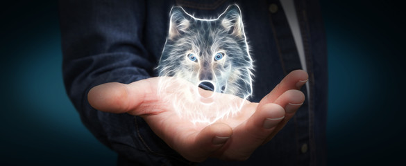 Personne tenant le rendu 3D de l& 39 illustration du loup en voie de disparition fractale