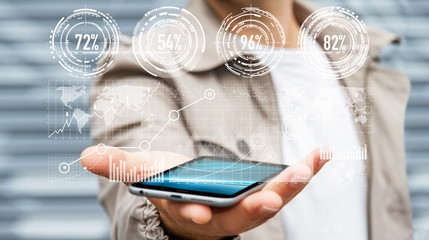 Businessman using digital graph interface ‘3D rendering’