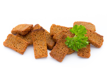 Bread croutons isolated on a white background.