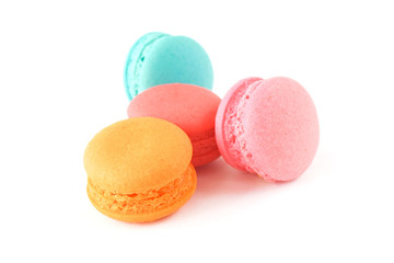 sweet macaroons on white background in soft focus