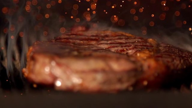 Cooking stake in slow motion