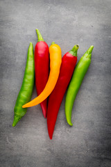 Chilli pepper on the grey background.