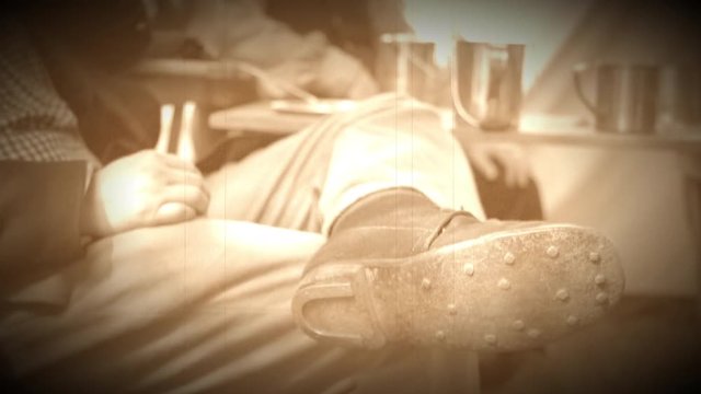 Civil War soldier reclining wearing old shoes (Archive Footage Version)