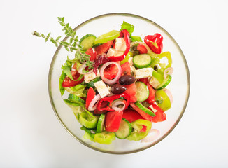 Greek salad on white background