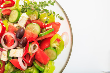 Greek salad on white background
