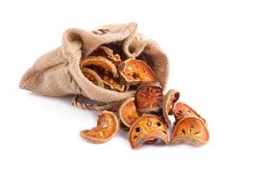 dried quince slices on a white background