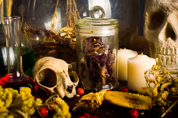 Witches table. Halloween or esoteric concept. On a black background.