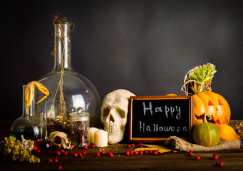 Witches table. Halloween or esoteric concept. Since the inscription on the Boards. On a black...