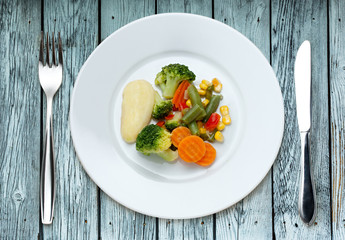 Fried vegetables on the plate