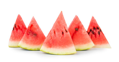 Triangular pieces of watermelon with seeds .On white isolated fone.