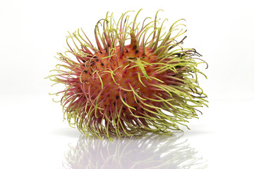 rambutan sweet delicious fruit isolated on white background. The name 'rambutan' is derived from the Malay-Indonesian languages word for rambut or "hair"