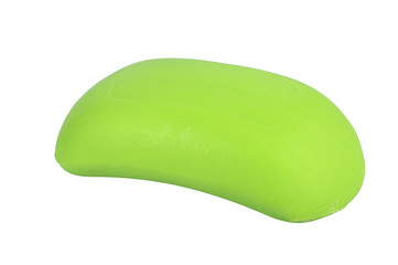 Green soap on a white, isolated background.