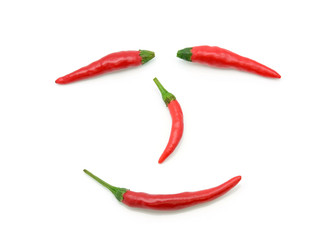 red chilli pepper smiley face on white