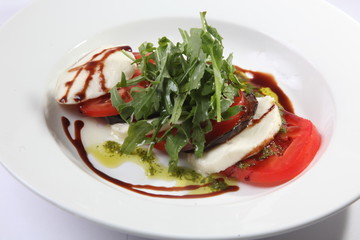 Caprese salad with tomato and cheese