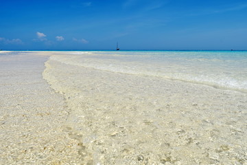 Clear water on the beach.