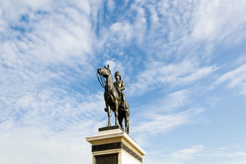 The equestrian statue of King Chulalongkorn (Rama V) with blue s
