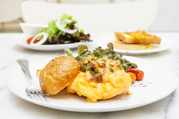 Egg omelette burger with saute vegetables