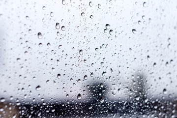 Naklejka na ściany i meble drops water after rainy on home window
