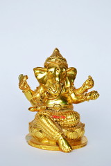 Fototapeta premium golden Ganesha statue Hinduism elephant head god worship for luck and success