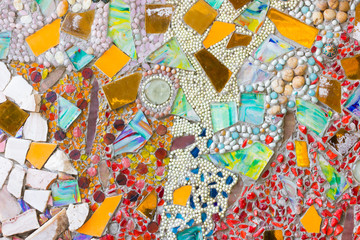 Colorful mosaic abstract background made of broken glass and ceramic