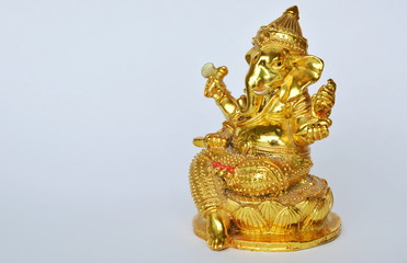 golden Ganesha statue Hinduism elephant head god worship for luck and success