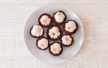 fresh mangosteen on wood