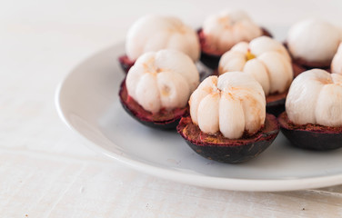 fresh mangosteen on wood