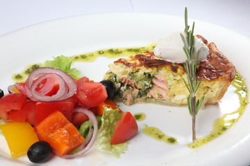 fish pie with vegetables on plate