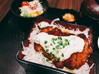 Katsudon - Japanese breaded deep fried pork cutlet with yellow gravy