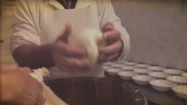 Vintage video. Making cheese traditional manually. 