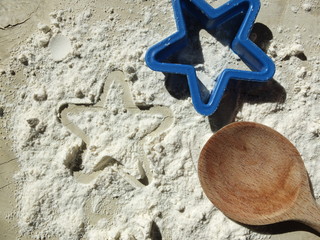 Wooden Spoon With Blue Cookie Cutter