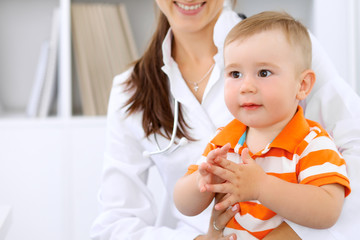 Little boy child  at health exam at doctor's office