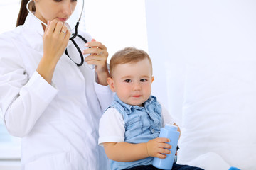 Little boy child  at health exam at doctor's office