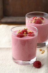 Two glass of smoothie with flakes