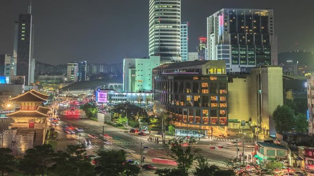 Seoul night traffic time lapse panorama. View on crossroads at the Dongdaemun (Heunginjimun) gate