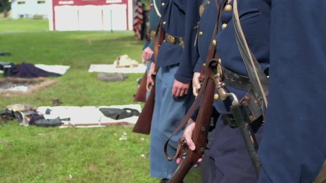 Civil War soldier march into camp