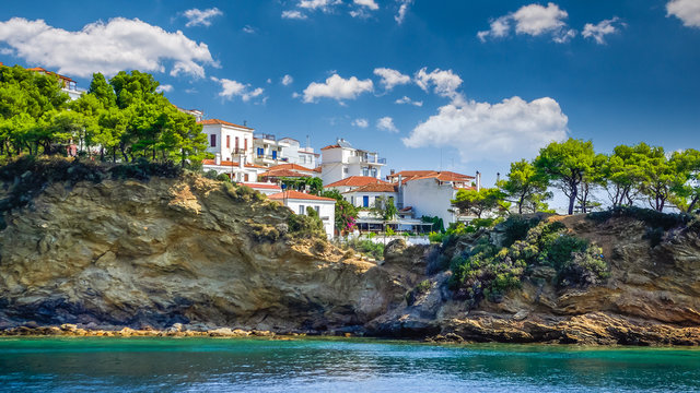 Skiathos town on Skiathos Island, Greece. Beautiful view of the old town with boats in the harbour.