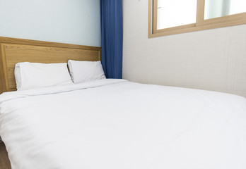 Interior of a double bed hotel room - small economy variant