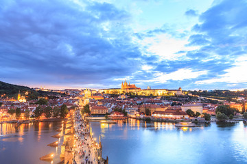 Naklejka premium Prague castle and the Charles bridge at dusk