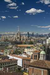 Milano, 2016 panoramic skyline with clear sky and Italian Alps