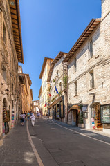 Fototapeta na wymiar Assisi, Italy. Colorful medieval Via San Francisco