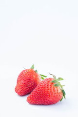 Strawberry on white background fruit's healthful cordial, useful