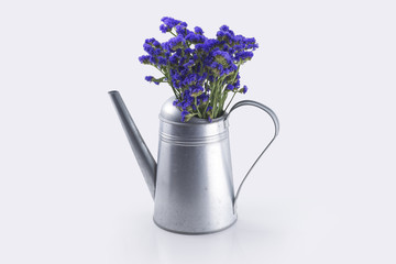 Flowers inserted in the kettle