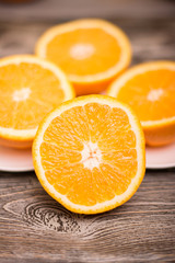 Fototapeta na wymiar oranges fruit on wooden background