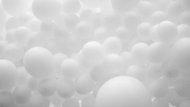 lot of white balloons fastened together