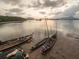 Fototapeta na wymiar Samchong-tai, Phangnga, Thailand,Fishing village and sunrise.