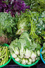 Assorted green vegetables Vietnamese farm market