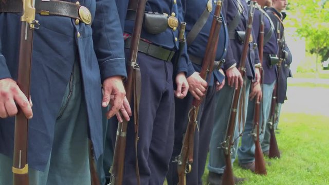 Civil War soldiers at attention and turn