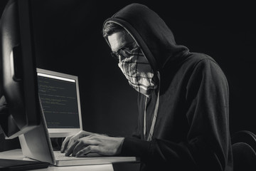 Man is hacking computer system